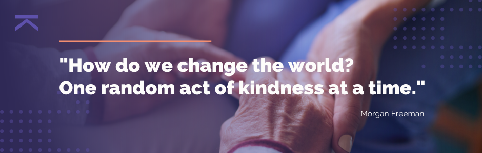 Photo with caption "How do we change the world? One random act of kindness at a time."