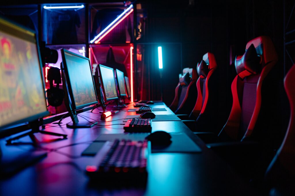 Gaming chairs side-by-side facing computers