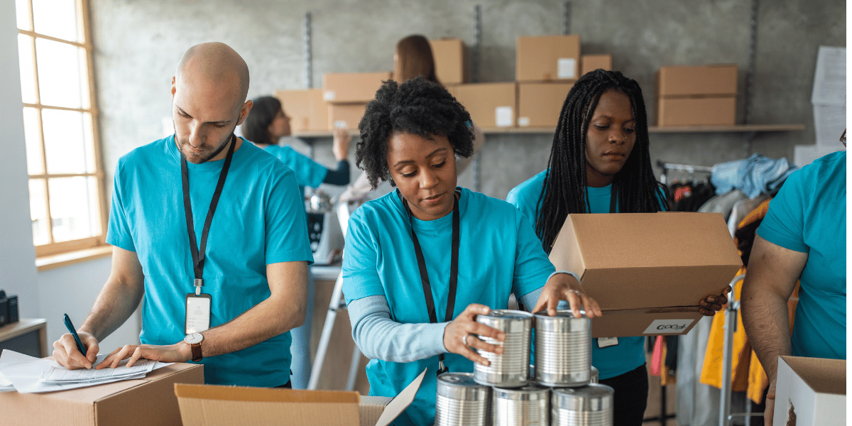 Employees volunteering at a donation center